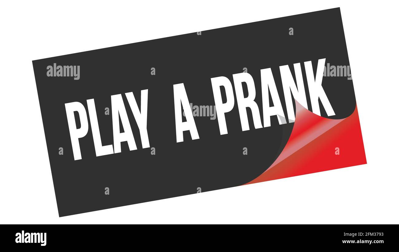 PLAY  A  PRANK text written on black red sticker stamp. Stock Photo