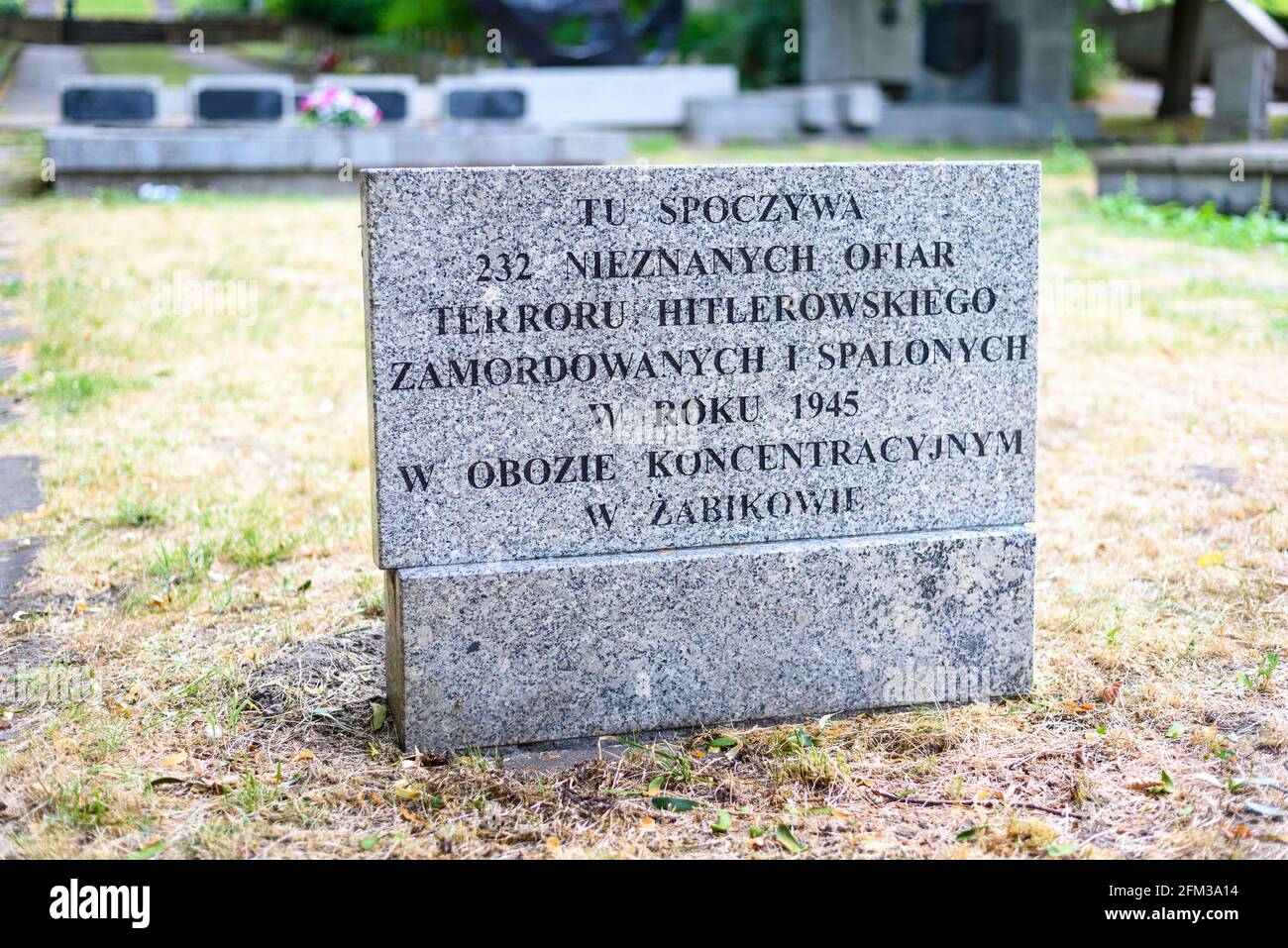 Poznan, wielkopolskie, Poland, 01.05.2021: Gravestone of 232 prisoners of Zabikow concentration camp in Cytadela, Poznan, Poland Stock Photo