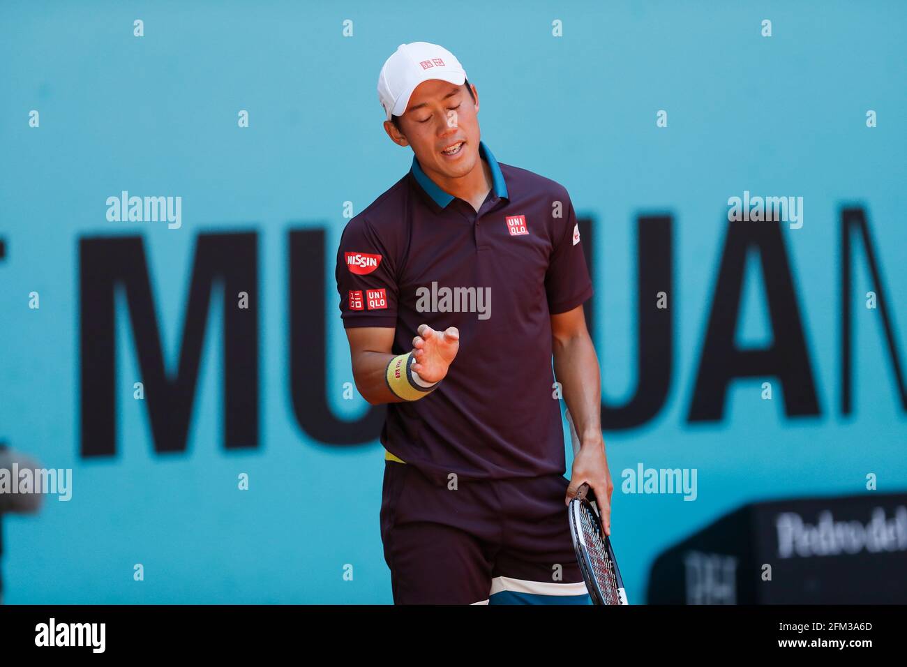 Madrid, Spain. 5th May, 2021. Kei Nishikori (JPN) Tennis : Kei Nishikori of Japan regret after miss play during Singles 2nd round match against Alexander Zverev of Germany on the ATP World Tour Masters 1000 'Mutua Madrid Open tennis tournament' at the Caja Magica in Madrid, Spain . Credit: Mutsu Kawamori/AFLO/Alamy Live News Stock Photo