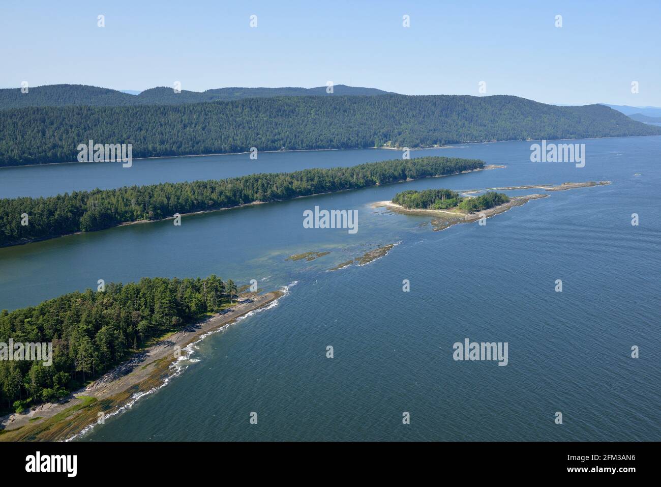 Aerial photo of Tumbo Island and Cabbage Island with Saturna Island in