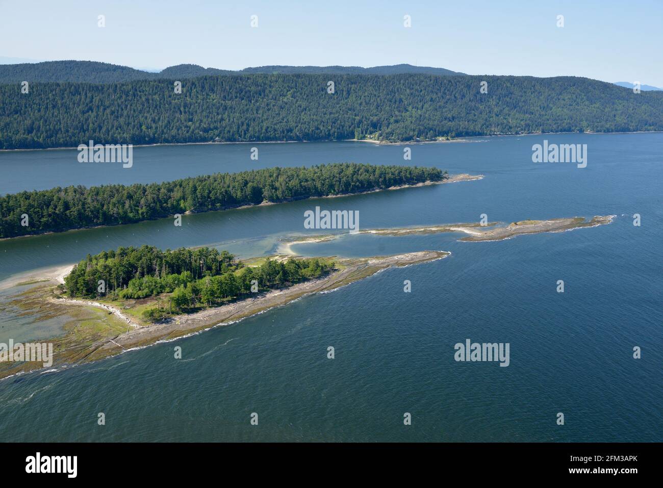 Aerial photo of Cabbage Island with Saturna Island in the background, Gulf Islands National Park Reserve of Canada, British Columbia, Canada. Stock Photo