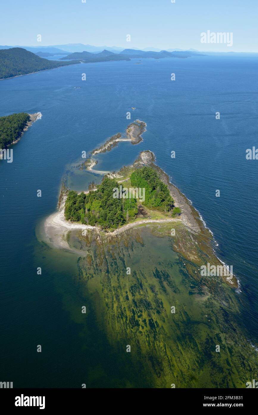Aerial photo of Cabbage Island and the exposed reefs, Gulf Islands