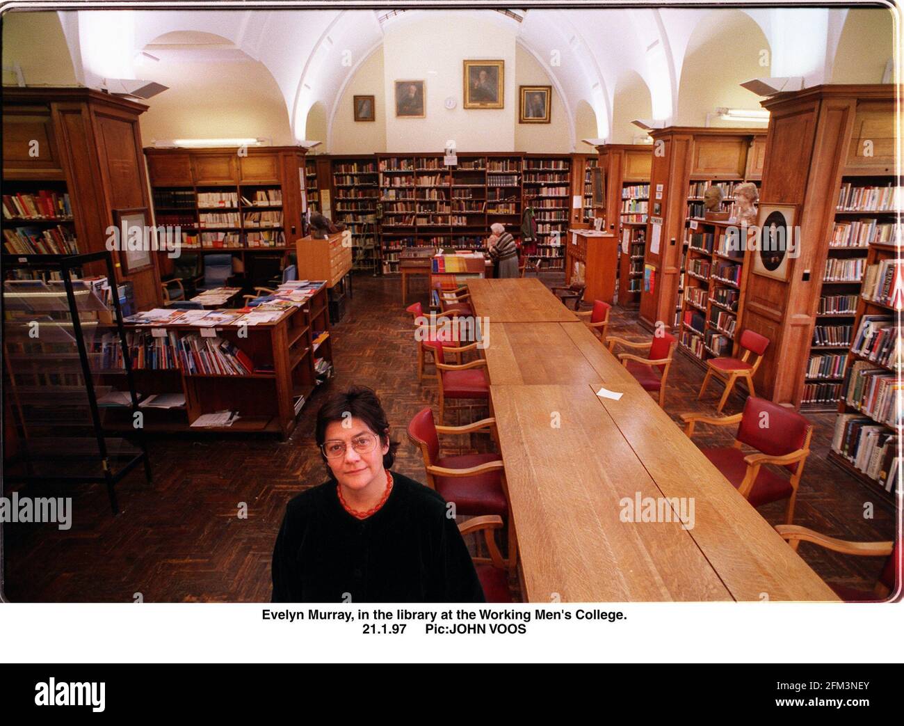 Evelyn Murray warden of the Working Mens College in Camden North London in the library Stock Photo