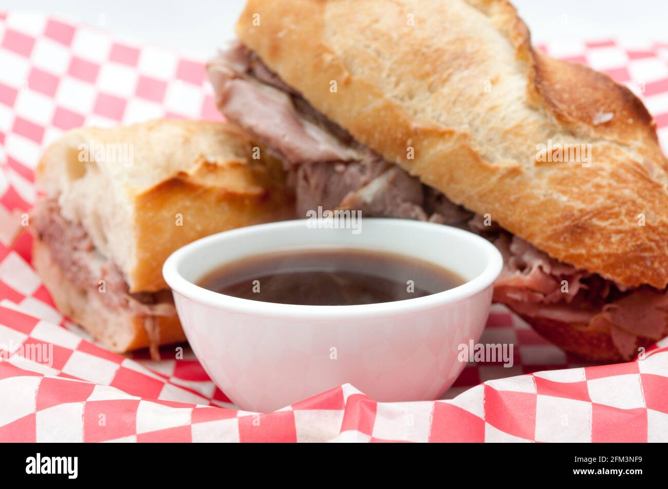 french beef dip sandwich au jus Stock Photo Alamy