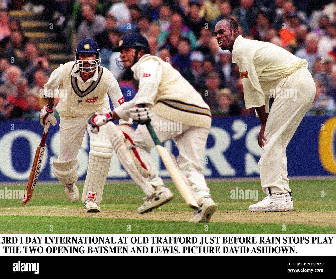 Sachin Tendulkar and Vikram Rathore take a quick run watched by Chris ...