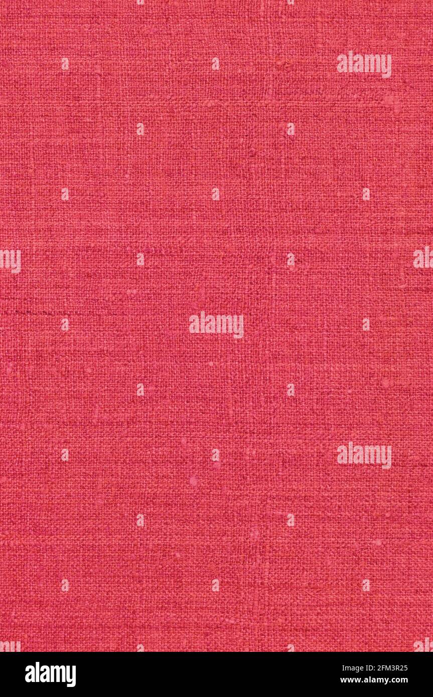 Natural light vibrant wine red rustic flax fiber linen fabric swatch texture horizontal pattern, vertical bright rough detailed vintage textile Stock Photo