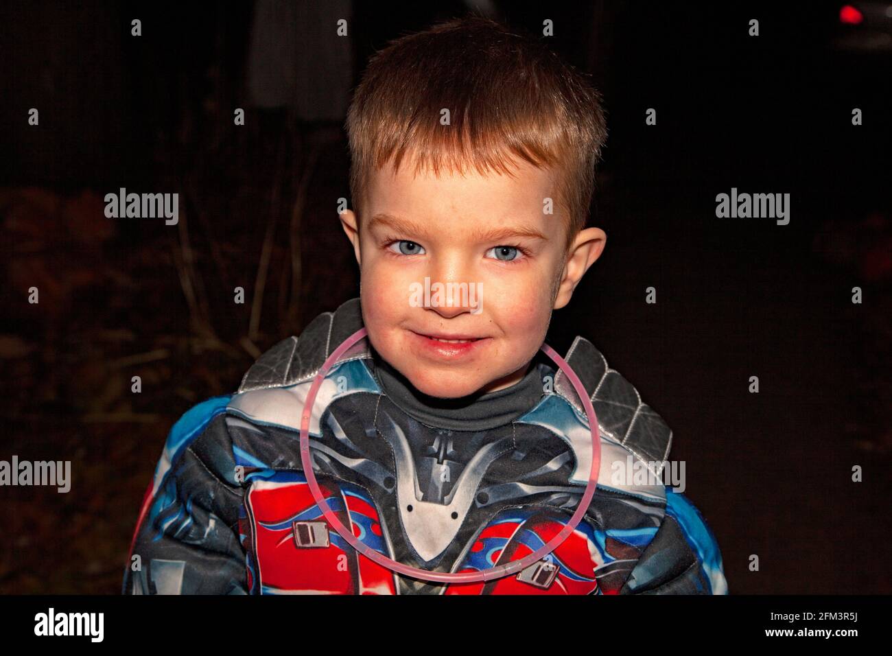 Halloween trick or treater costumed in an outer space adventure soldiers uniform. St Paul Minnesota MN USA Stock Photo