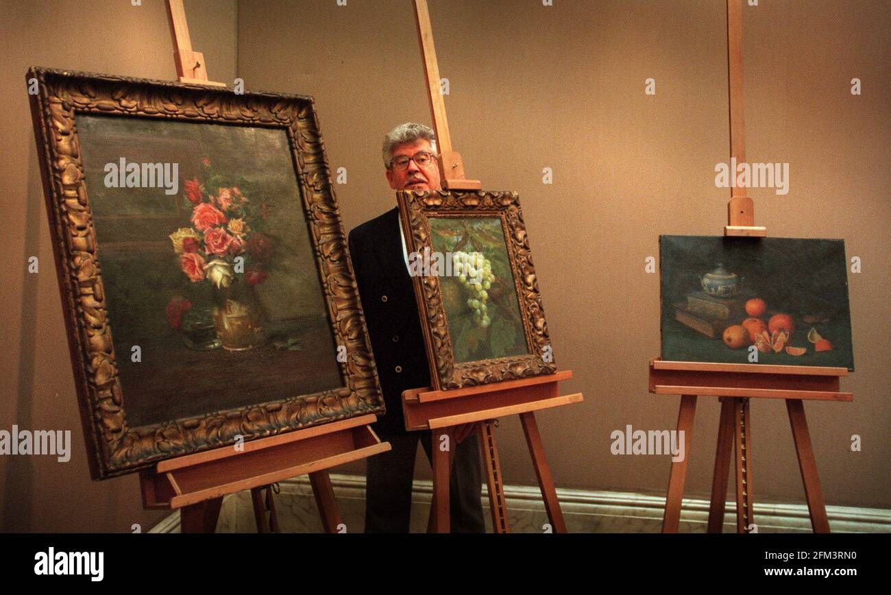 Rolf Harris with his grandfathers paintings Stock Photo Alamy