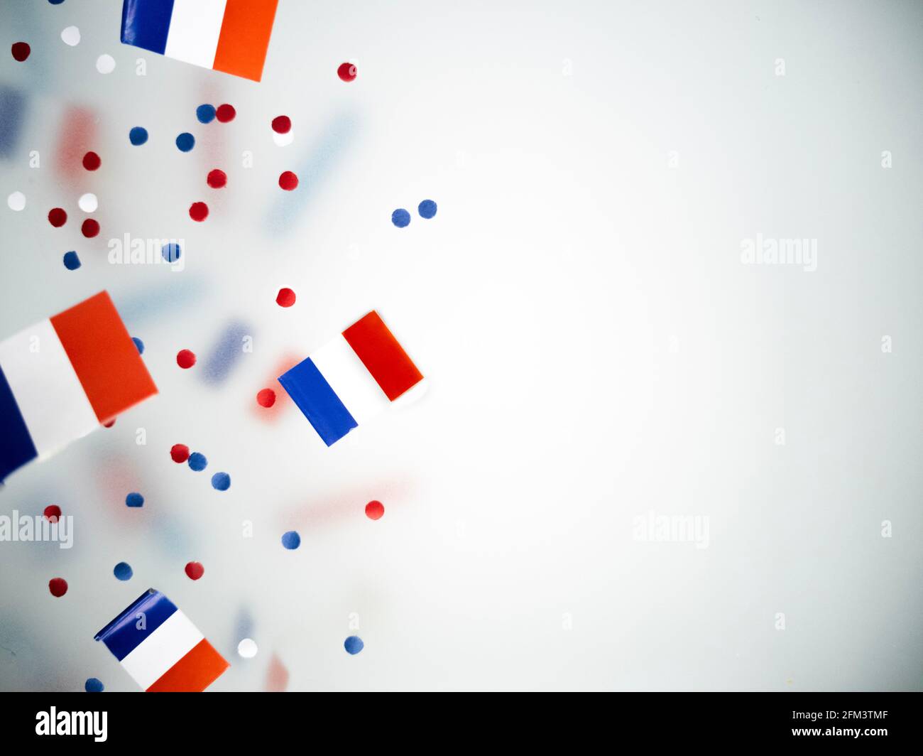 national holiday of July 14 is a happy Independence Day of France, Bastille Day, the concept of patriotism, memory,  confetti and flags Stock Photo