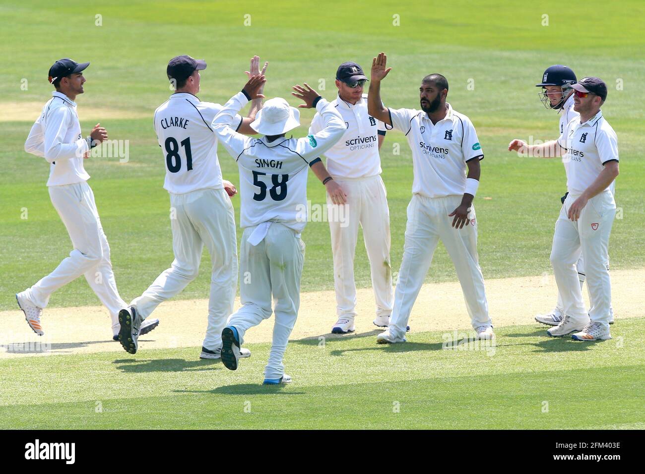 Jeetan Patel of Warwickshire is congratulated by his team mates after taking the wicket of Tom Westley during Essex CCC vs Warwickshire CCC, Specsaver Stock Photo