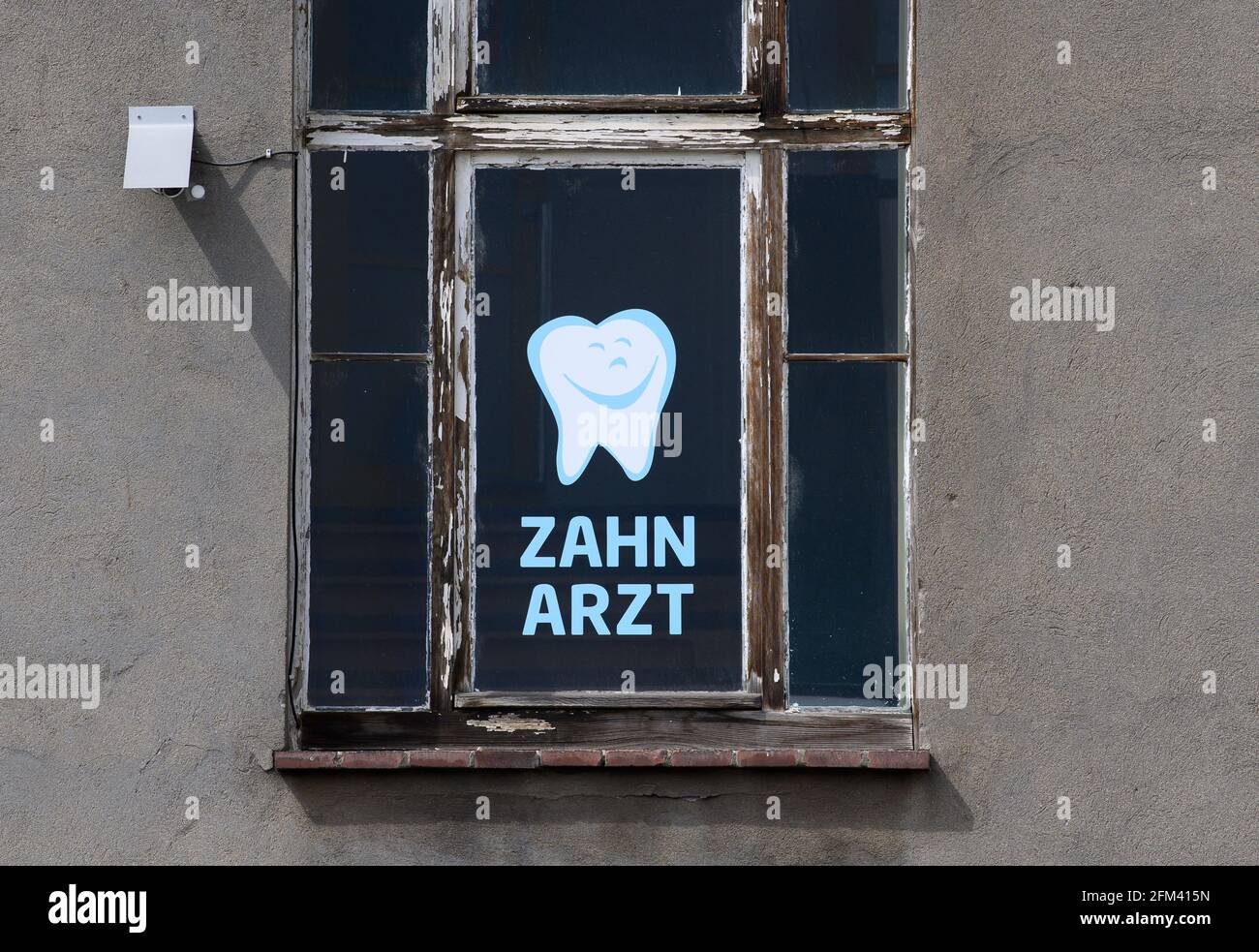 Dresden, Germany. 30th Apr, 2021. Dentist is written on a window of a house in which a dental practice is located. Credit: Robert Michael/dpa-Zentralbild/ZB/dpa/Alamy Live News Stock Photo