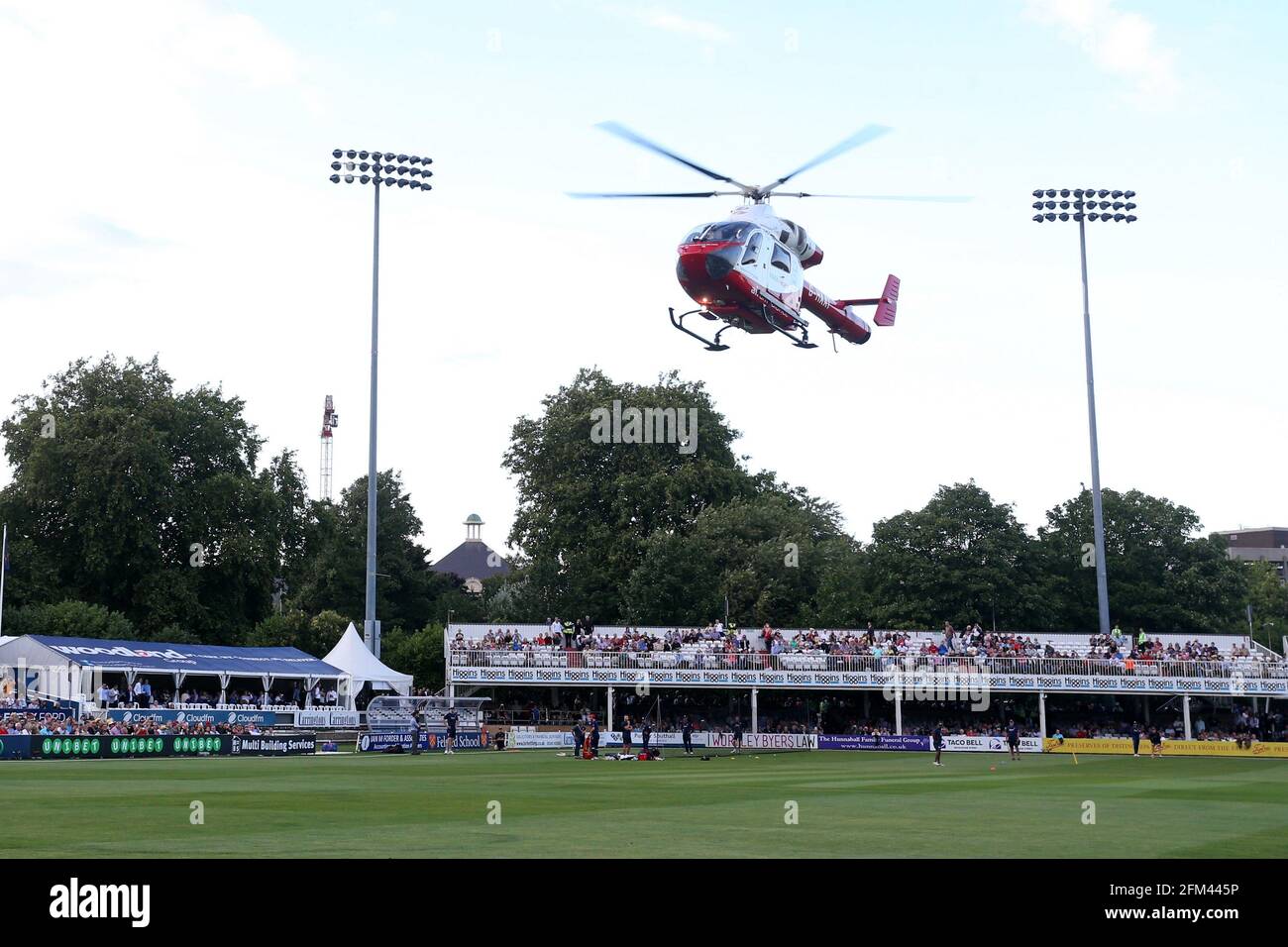 The Essex & Herts Air Ambulance leaves the ground after attending a medical emergency ahead of Essex Eagles vs Kent Spitfires, NatWest T20 Blast Crick Stock Photo