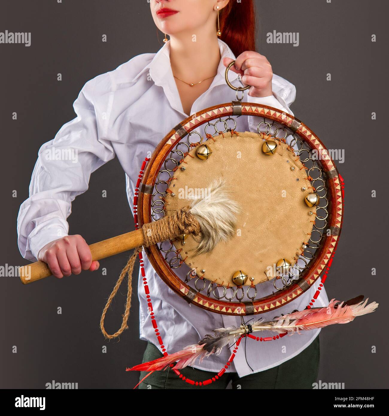 The girl plays the tambourine. According to legends, every system