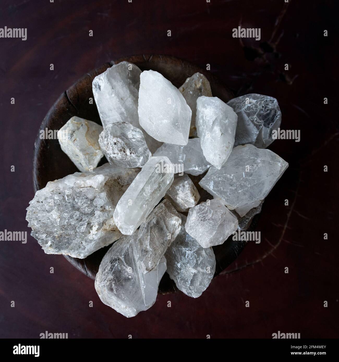 Crystals in a wooden bowl Stock Photo Alamy
