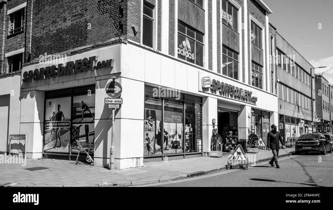Kingston Upon Thames London UK, May 04 2021, Black and White Image high Street Branch Of Sports Direct Exterior Stock Photo