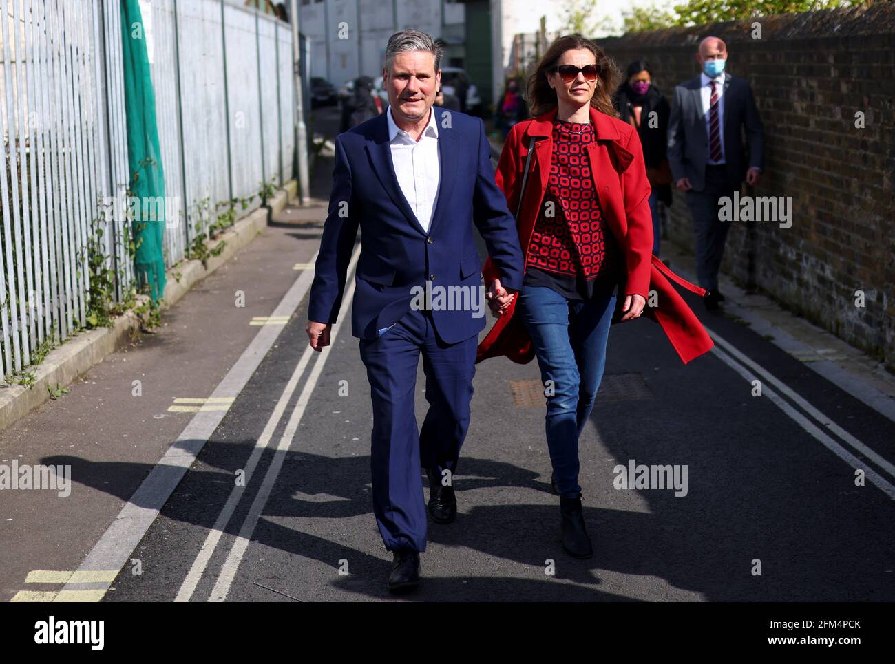 Britain's Labour Party leader Keir Starmer and his wife Victoria walk after casting a vote during local elections, in London, Britain May 6, 2021. REUTERS/Tom Nicholson Stock Photo