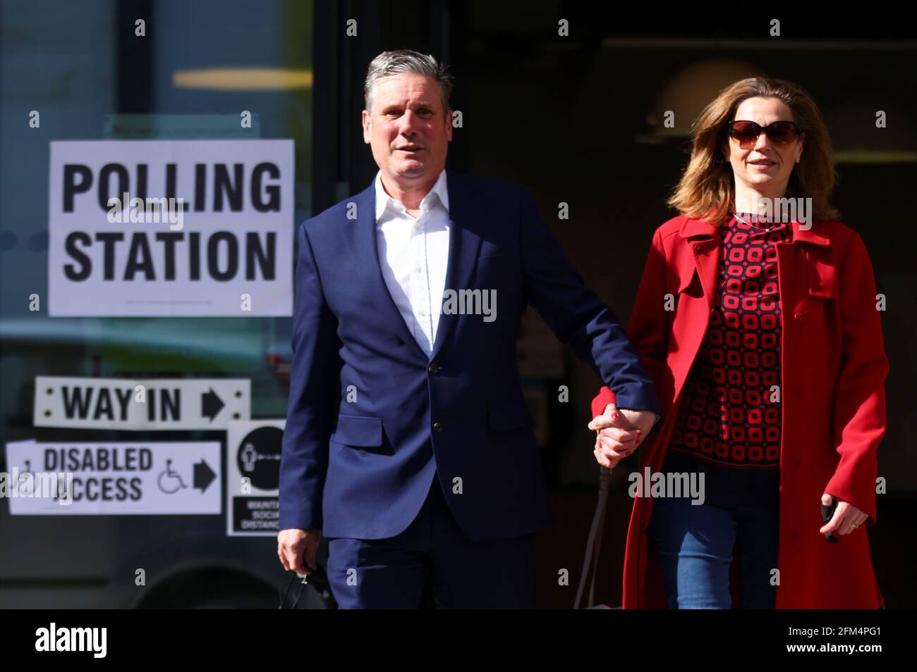 Britain's Labour Party leader Keir Starmer and his wife Victoria leave a polling station after casting a vote during local elections, in London, Britain May 6, 2021. REUTERS/Tom Nicholson Stock Photo