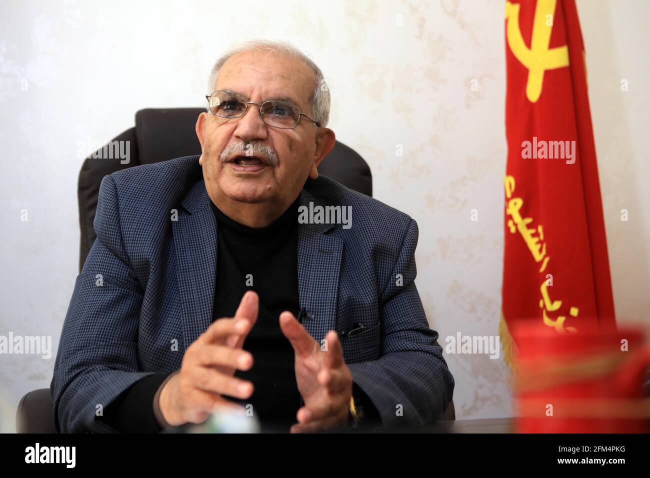 (210506) -- AMMAN, May 6, 2021 (Xinhua) -- Secretary General of Jordan's Communist Party Faraj Itmeiza speaks in an interview with Xinhua in Amman, Jordan, April 6, 2021. Upholding the people-centered philosophy, the Communist Party of China (CPC) has kept the Chinese people as the top priority and striven to serve them wholeheartedly, Itmeiza has said.   TO GO WITH 'Interview: Jordanian communist party leader praises CPC's people-centered philosophy' (Photo by Mohammad Abu Ghosh/Xinhua) Stock Photo
