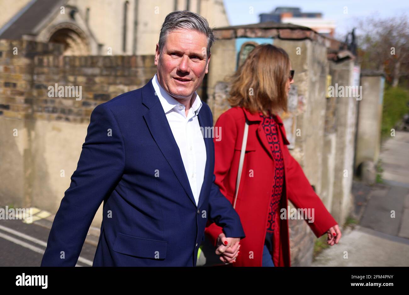 Britain's Labour Party leader Keir Starmer and his wife Victoria walk after casting a vote during local elections, in London, Britain May 6, 2021. REUTERS/Tom Nicholson Stock Photo