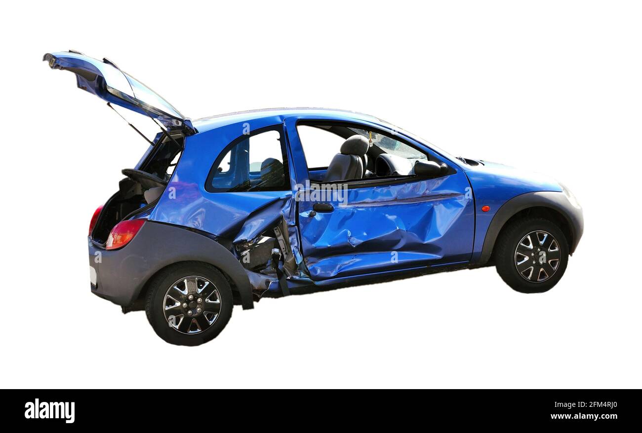 Crashed blue car with opened trunk, isolated on a white background. Damaged blue car after the accident. Stock Photo