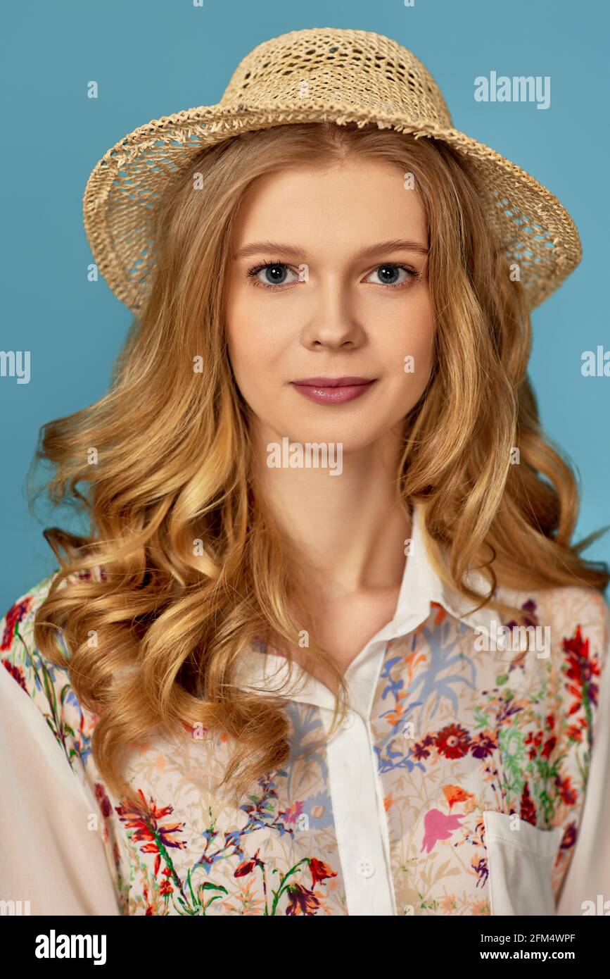 portrait of beautiful young blonde woman in straw hat Stock Photo - Alamy