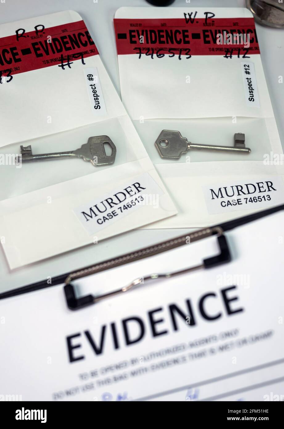 keys in evidence bag, crime lab criminal investigation, conceptual image Stock Photo