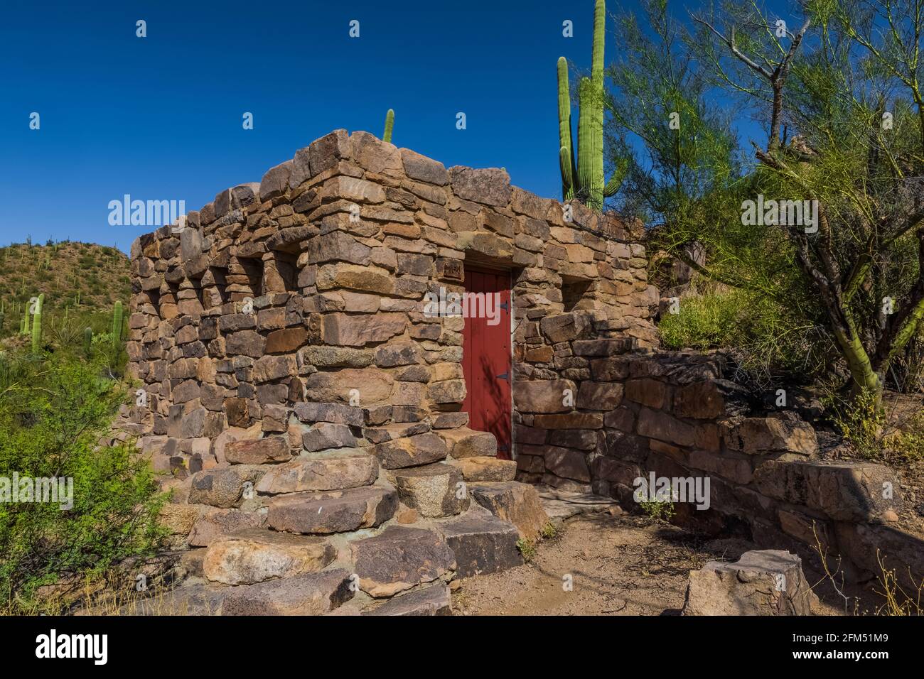 Old stone restroom in the Ez-Kim-In-Zin Picnic Area built by the Civilian Conservation Corps during the Great Depression, Saguaro National Park, Tucso Stock Photo