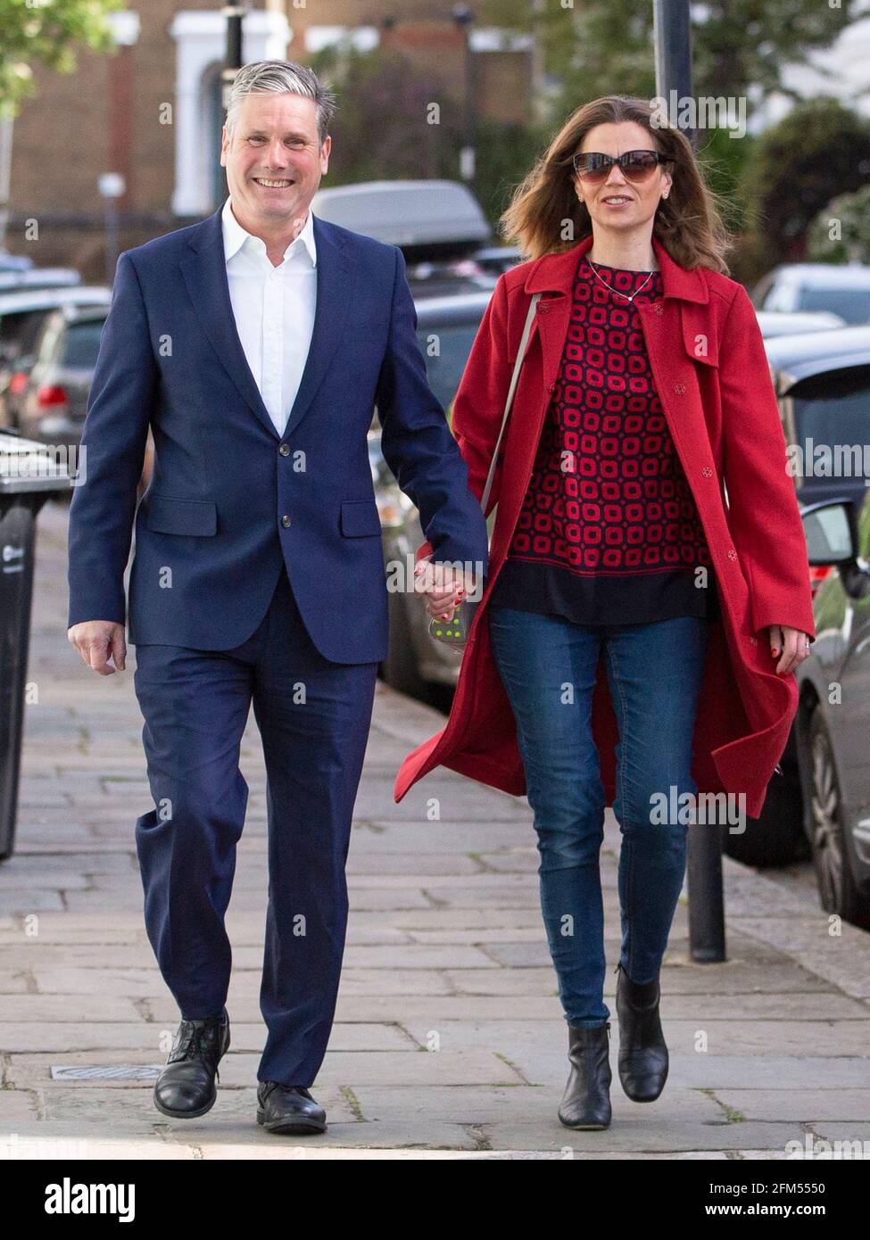 Labour Leader Sir Keir Starmer and wife Victoria leave walk to their local Polling Station on the 6th of May 2021, in North London, UK Stock Photo