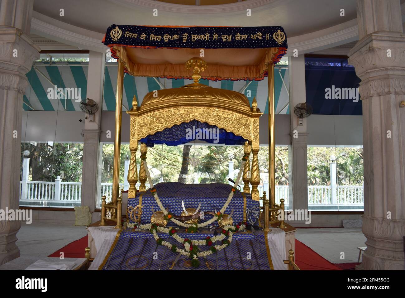 Inside view of Darbar Sahib or main hall , Guru Nanak Darbar Gurudwara. Cantonment area of Pune, Maharashtra, India Stock Photo