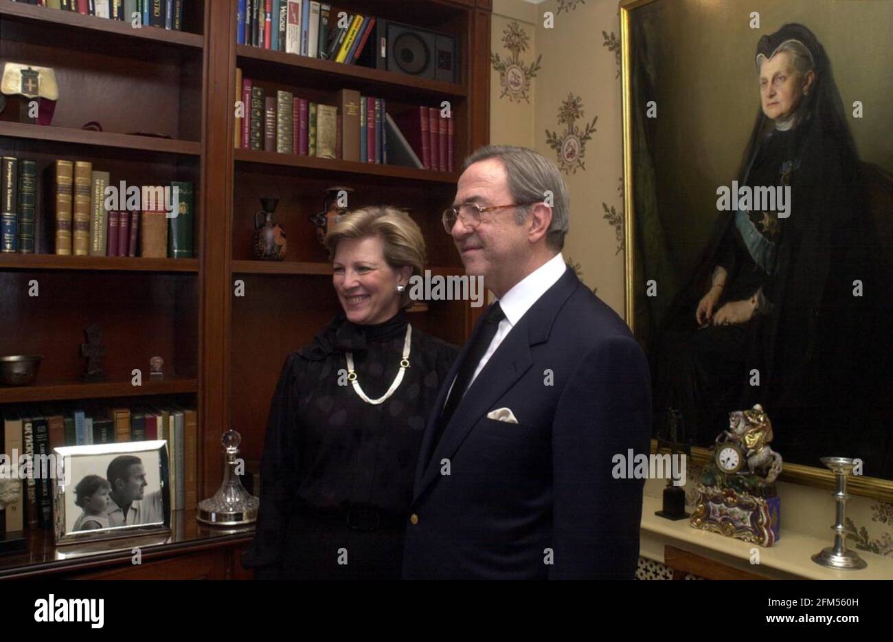 Ex-King Constantine of Greece, and his wife December 2000 ex-queen Anne-Marie, in their london home after today's court ruling. The portrait is his great grand-mother, Queen Olga. Stock Photo