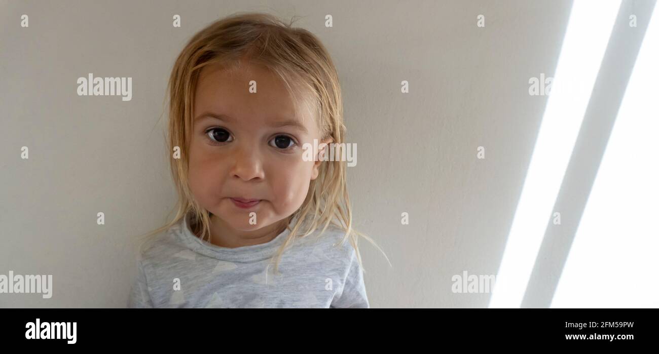 Portrait of cute little funny caucasian child at white background Stock ...
