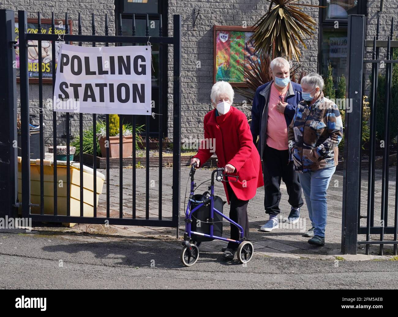 Voters leave a polling station in Golborne Library, Golborne, Warrington, after voting in the Manchester Mayoral elections. Picture date: Thursday May 6, 2021. Stock Photo