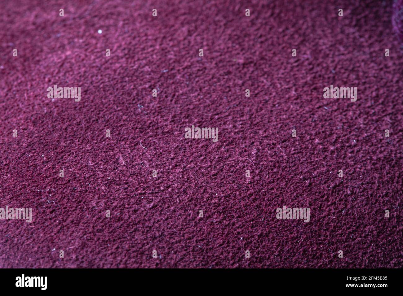 wine color suede textured background for design purpose Stock Photo