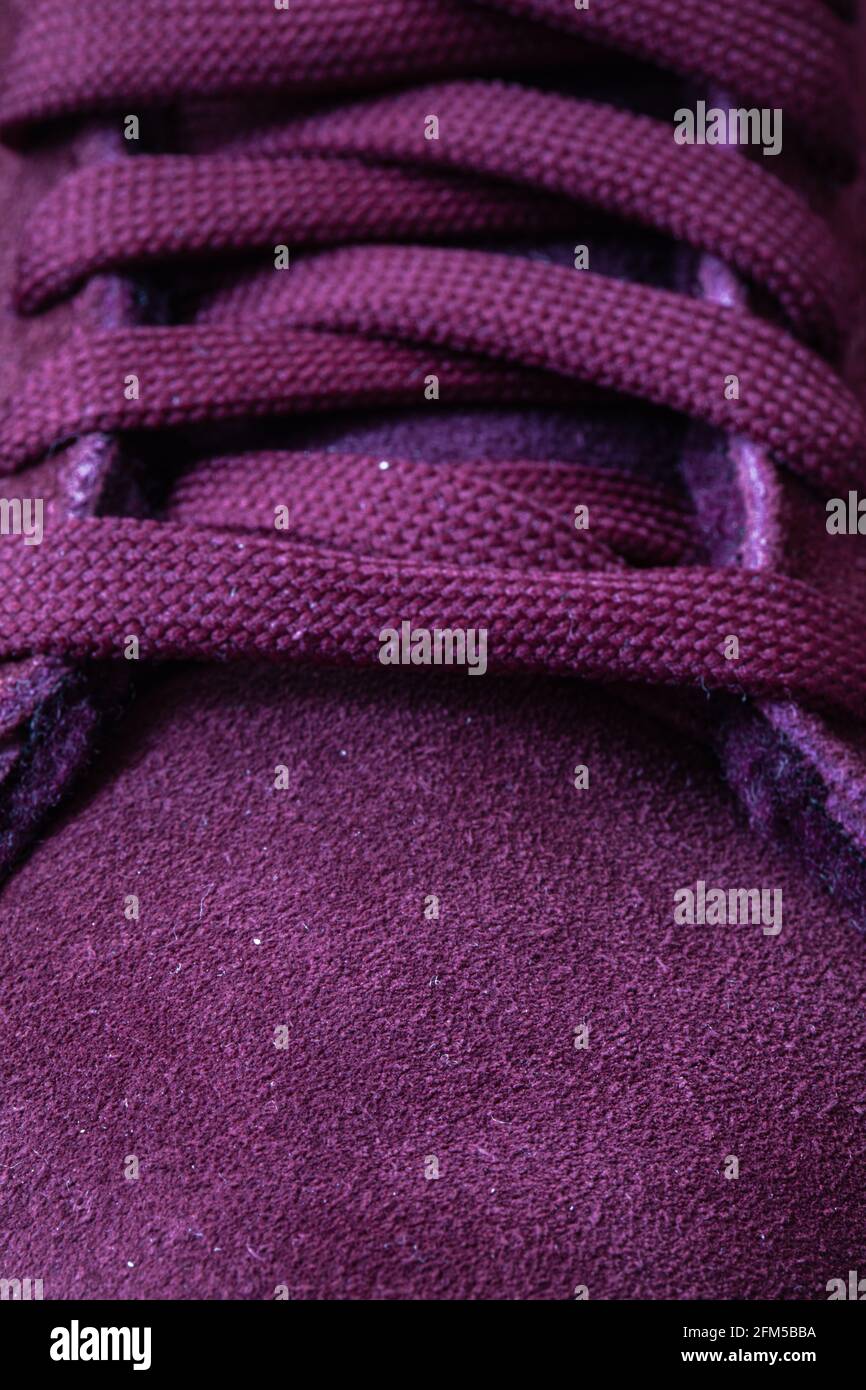 Closeup of wine color sneakers for design purpose Stock Photo Alamy