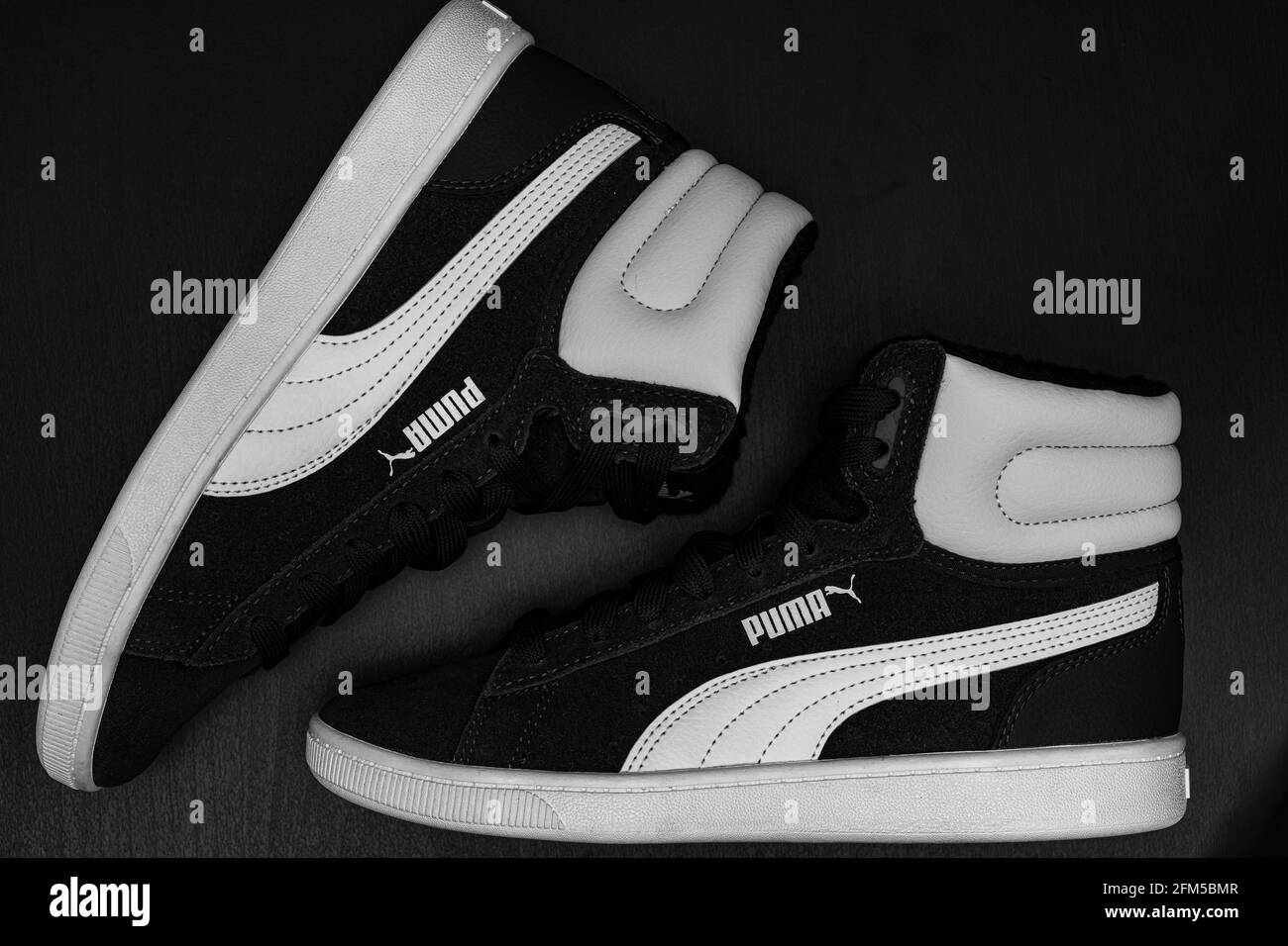 Shoes trainers puma Black and White Stock Photos & Images - Alamy