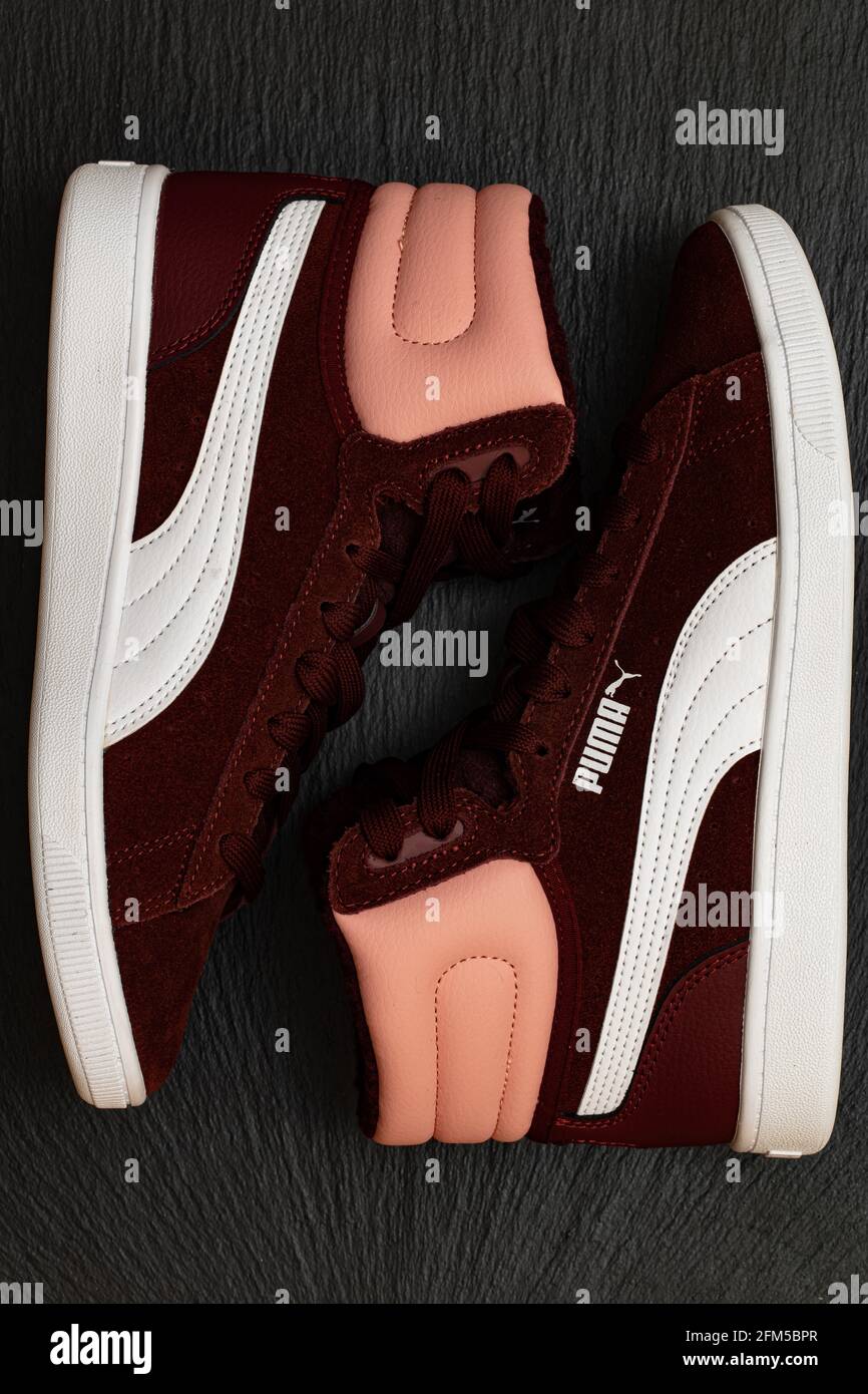 Herzogenaurach, Germany - May 5, 2021: Vineyard Wine Puma Vikky v2 Mid Fur  Jr sneakers Stock Photo - Alamy