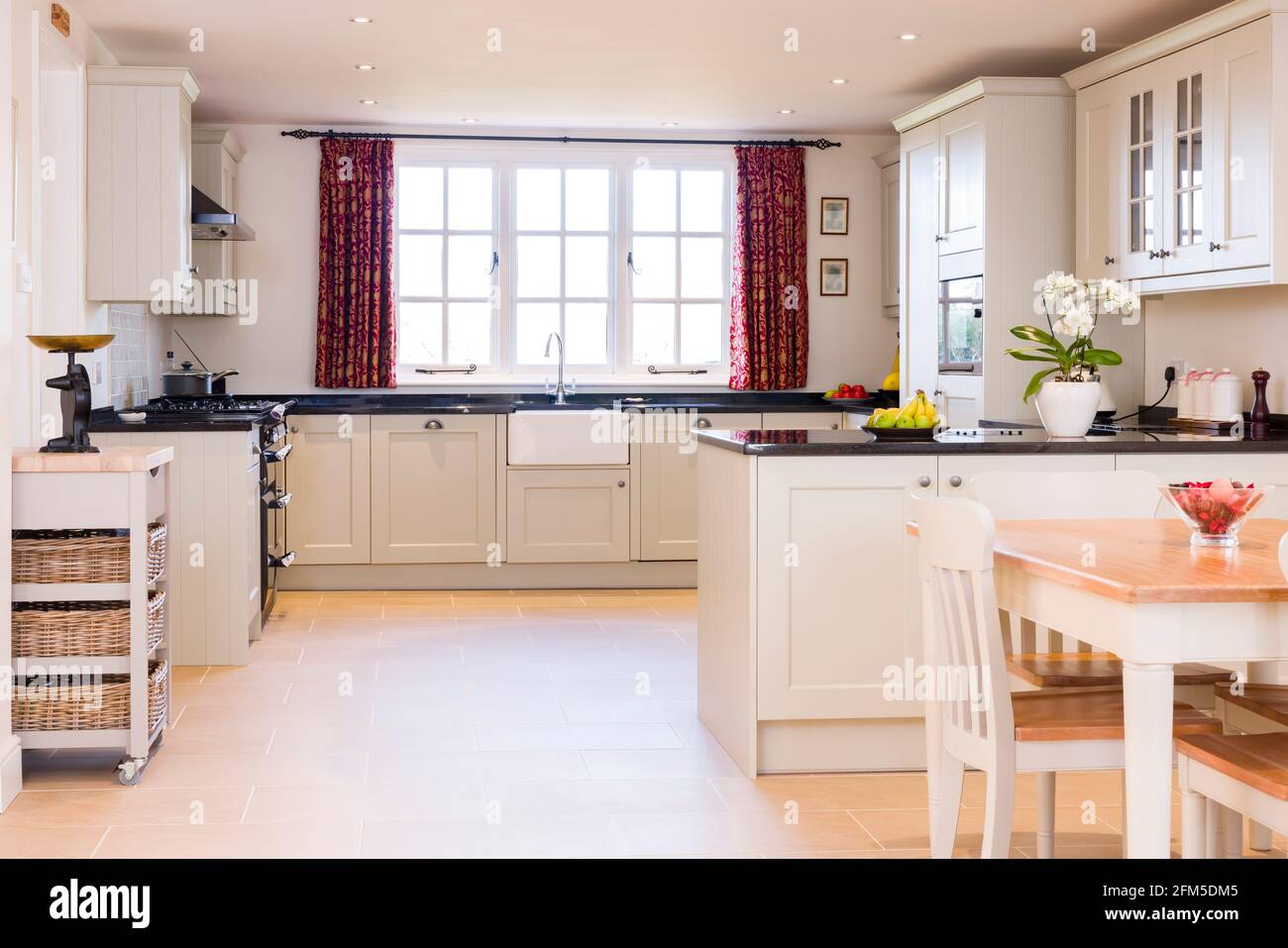 Painted wood shaker style kitchen interior design, UK luxury kitchens Stock Photo