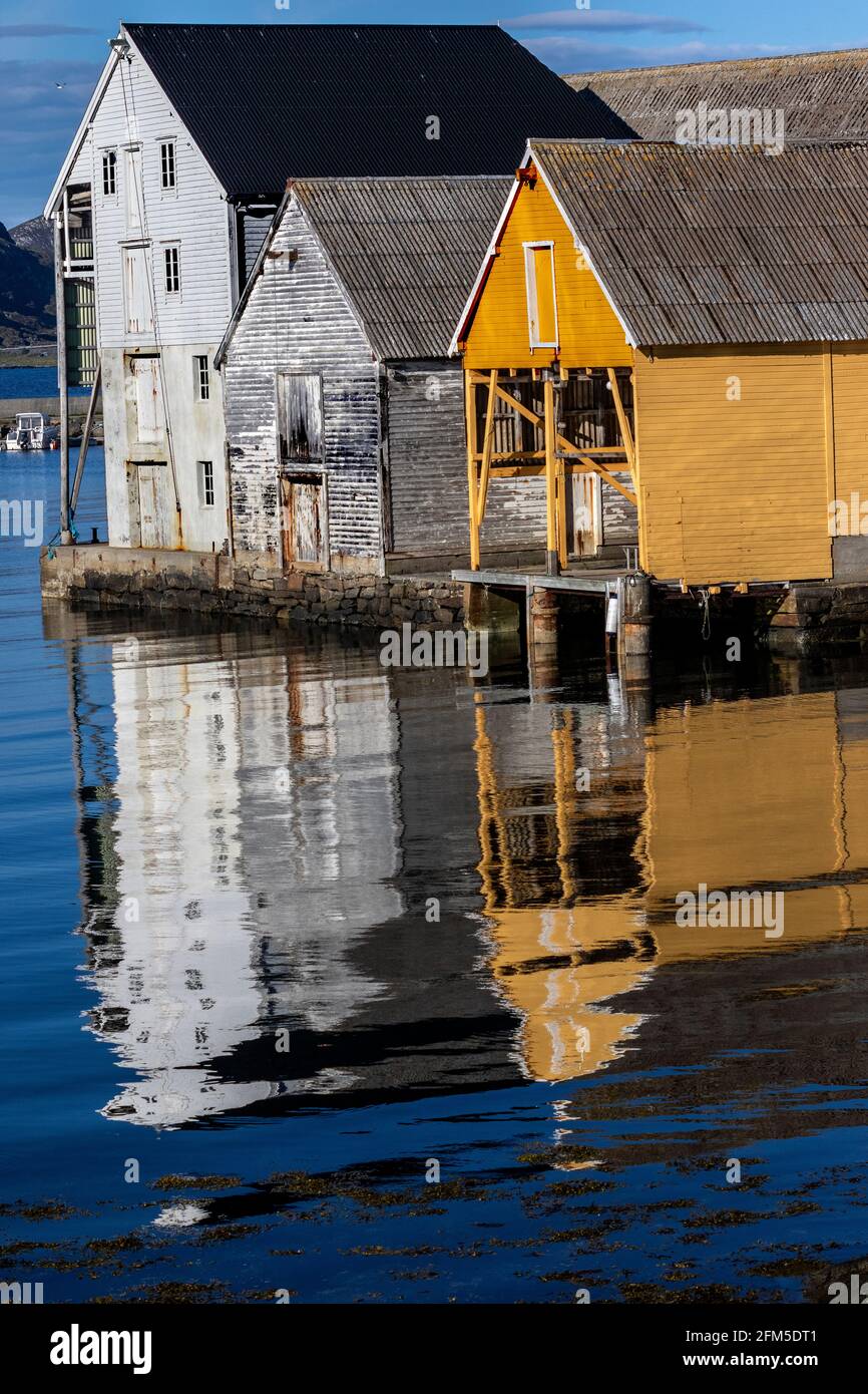 Boathouses in the small port at  Runde island, on the west coast of Norway. Stock Photo