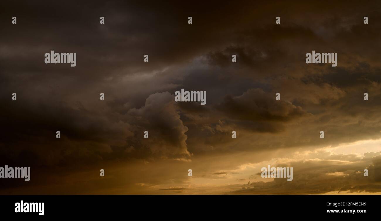 Beautiful colorful sunset sky with clouds and sunlight Stock Photo - Alamy