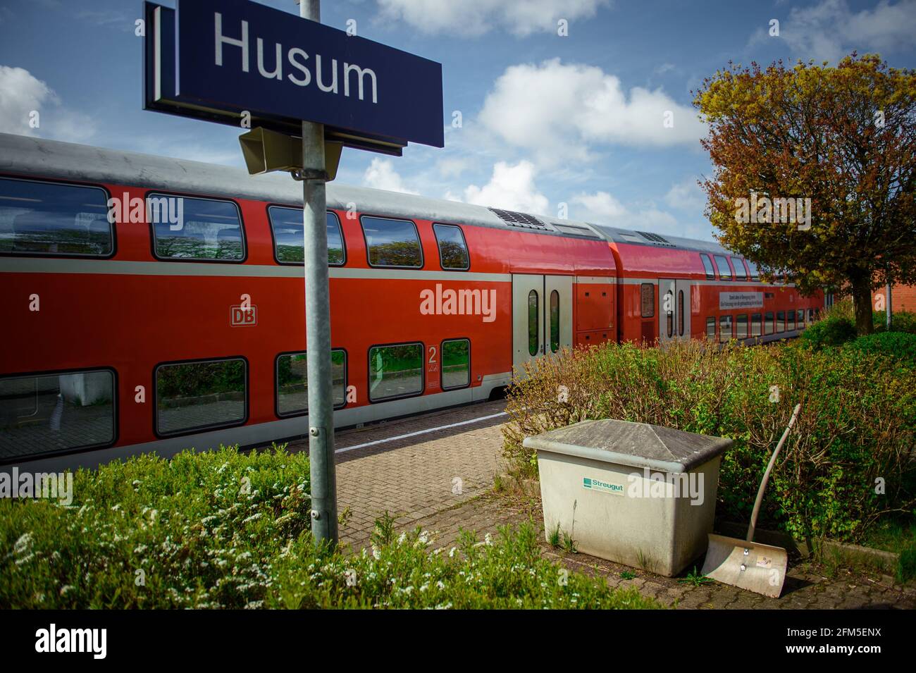 Husum, Germany. 06th May, 2021. A DB Regio double-decker train stands at a  track at Husum station as part of the presentation of the increase in  seating capacity on the Marschbahn. DB