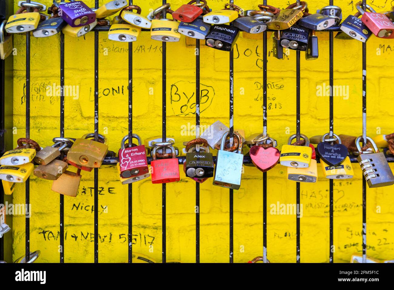 Love locks and fan locks padlocked to a 'Echte Liebe' (true love) fan wall also called 'wall of love' at Signal Iduna Park, Borussia Dortmund BVB 09 Stock Photo