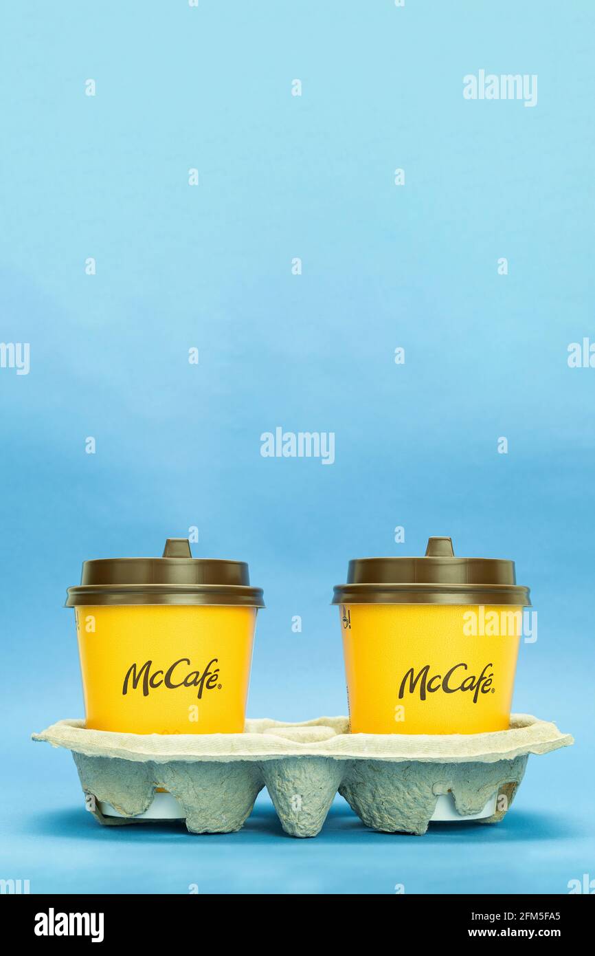 Warsaw, Poland - March 25, 2021: Two paper coffee cups on a stand. Two ...