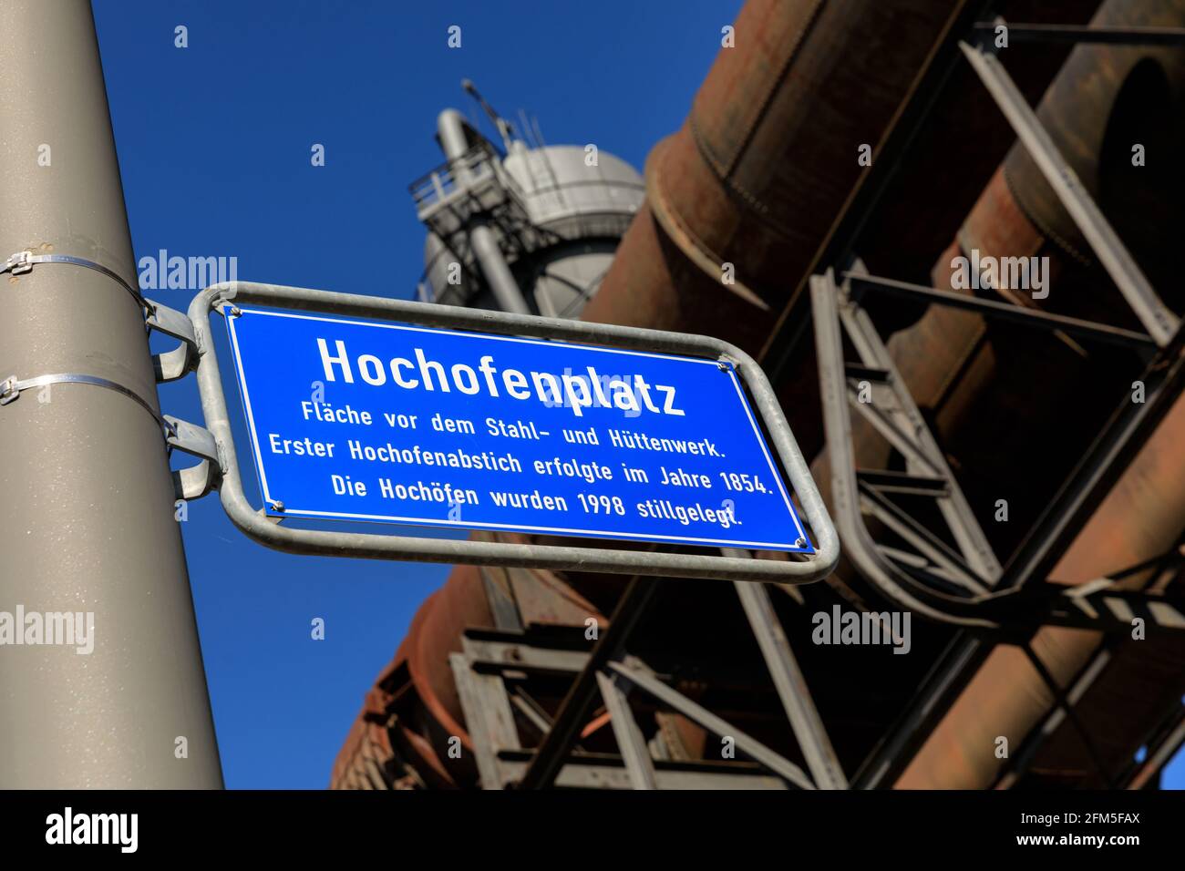 Hochofenplatz, sign illustrating the historic site of the former ThyssenKrupp steelworks at Phoenix West, Dortmund, Germany Stock Photo