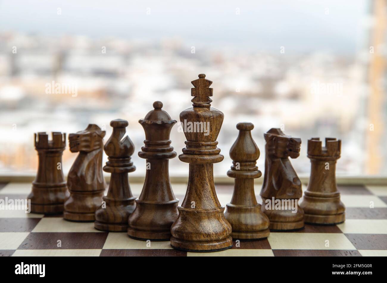 Chess team building strategy - King leadership. Stock Photo