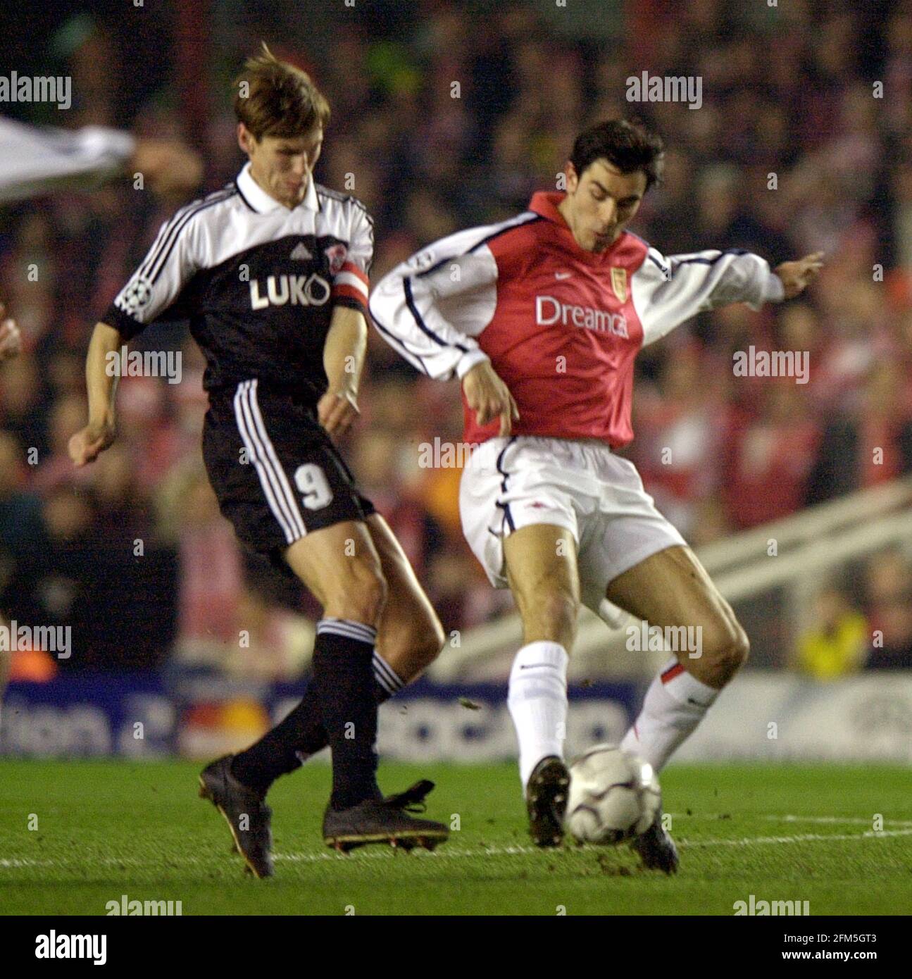 ARSENAL V SPARTAK MOSCOW 6/3/2001  TITOV   OF SPARTAK MOSCOW BEING TACKLED BY ROBERT PIRES Stock Photo