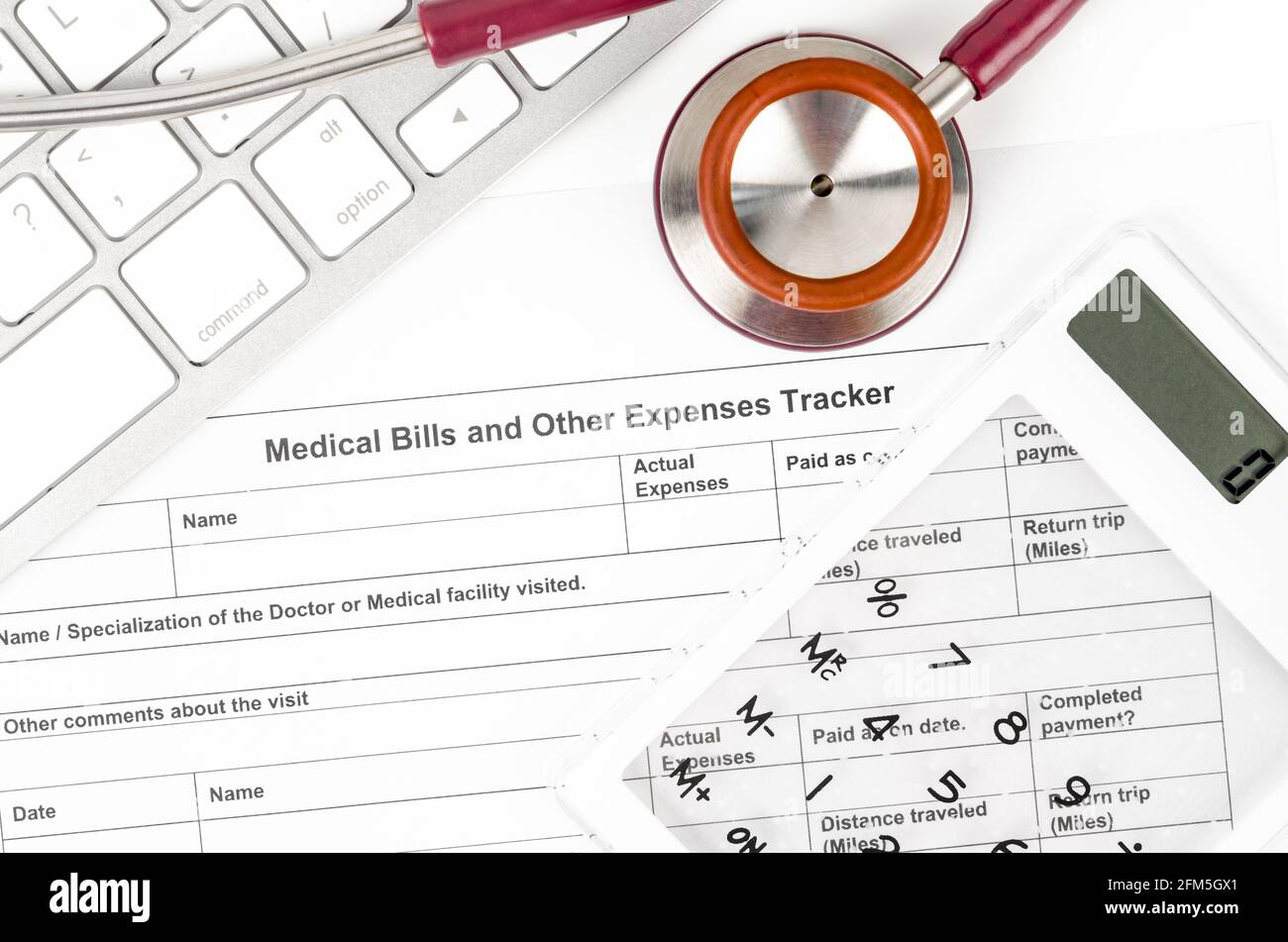 Medical bills and other Expenses tracker form with calculator Stock Photo Alamy