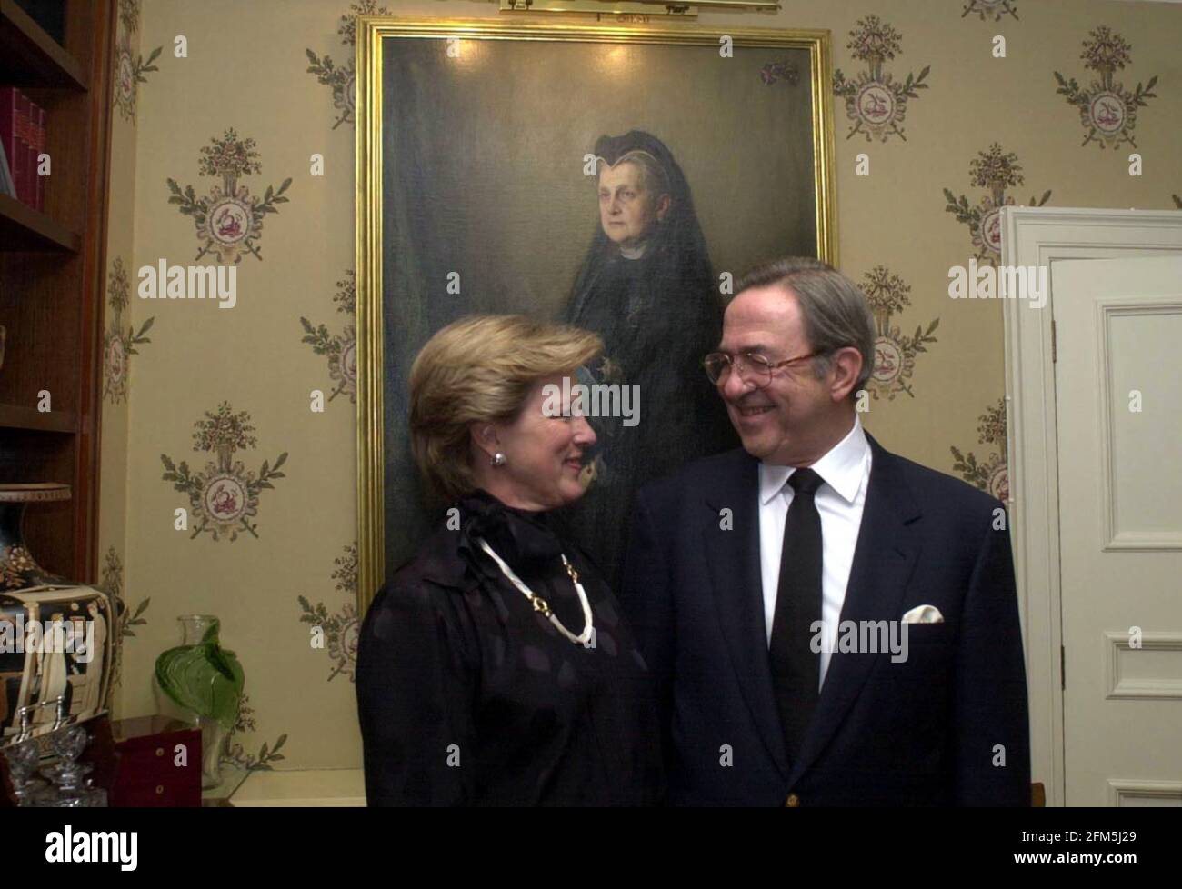 Ex-King Constantine of Greece, and his wife December 2000 ex-queen Anne-Marie, in their london home after today's court ruling. The portrait is his great grand-mother, Queen Olga. Stock Photo