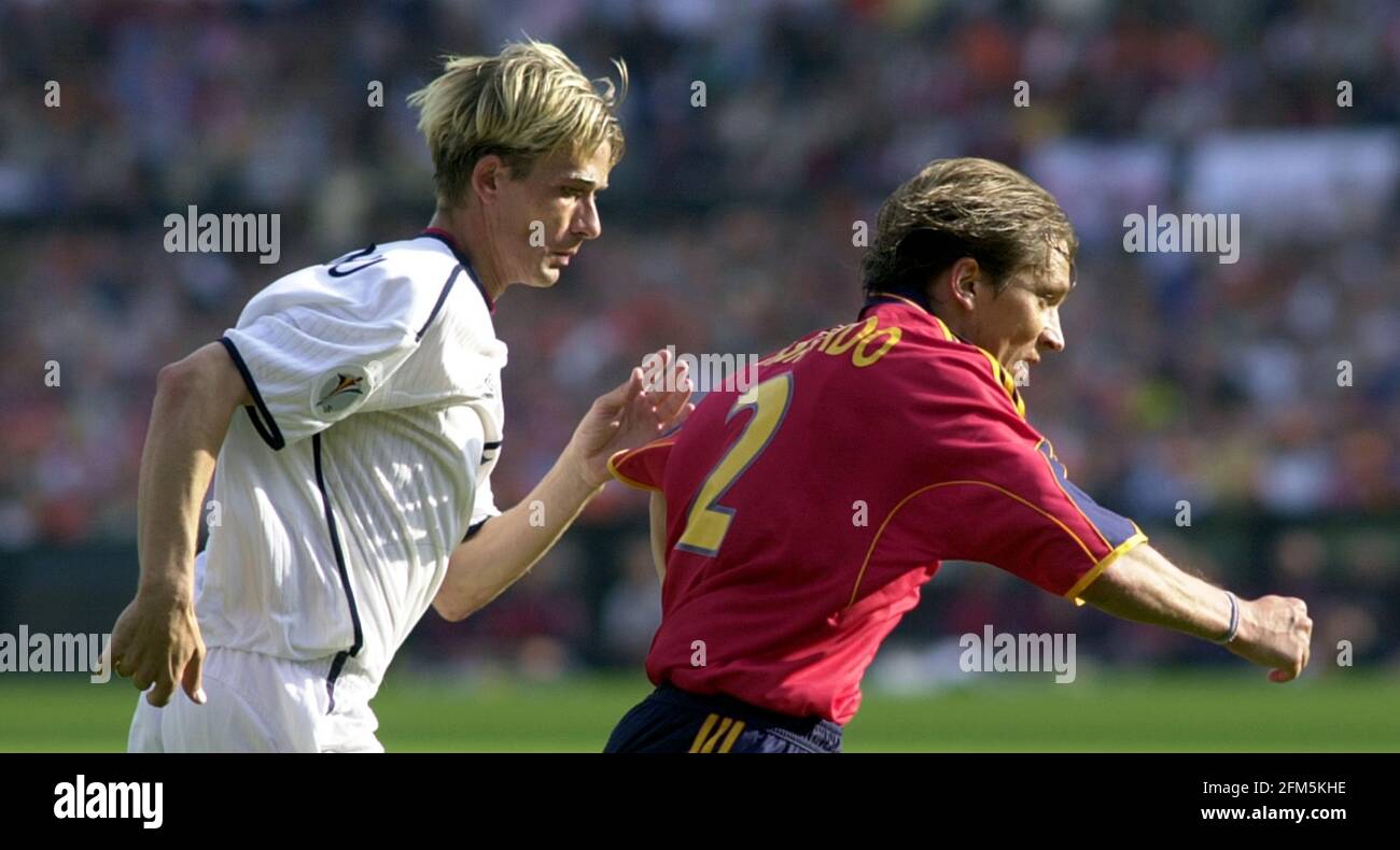 Michel Salgado of Spain and Andre Bergstad of Norway play their opening match in Rotterdam Stock Photo