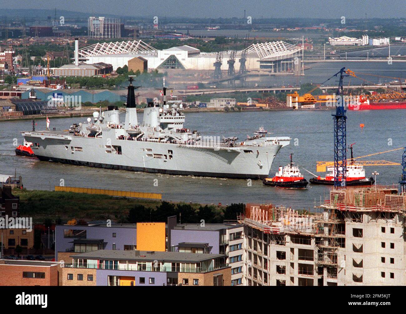 The Royal Navys Aircraft Carrier HMS Invincible July 2000  sailing up the River Thames Stock Photo