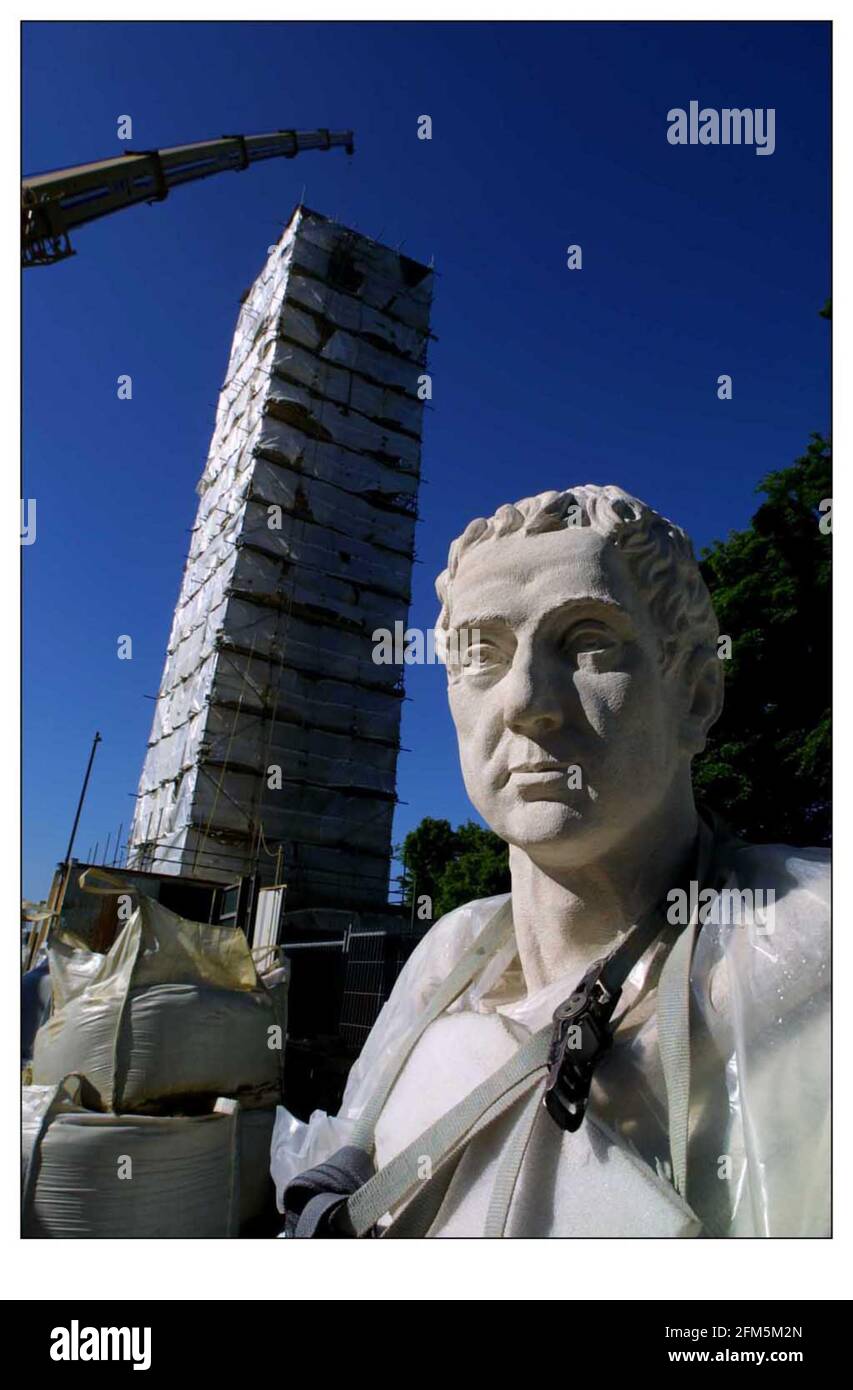 Astatue of Lord Cobham being installed in the world famous landscape gardens he created at Stowe. The original statue was knocked from its vantage point atop the tallest of Stowes monuments in 1957 when it was struck by lightning and shattered. pic David Sandison 30/5/2001 Stock Photo